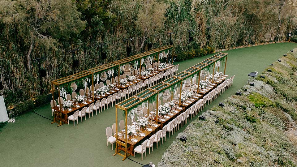 A Breathtaking Wedding Setup at Island Art & Taste: Wooden Pergolas, Chandeliers & Elegant Décor